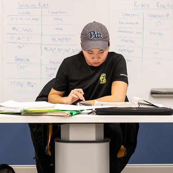 ROTC student studying at desk